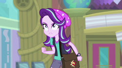 Size: 1280x718 | Tagged: safe, screencap, starlight glimmer, equestria girls, mirror magic, spoiler:eqg specials, beanie, hat, solo