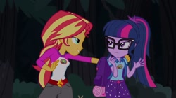 Size: 1100x618 | Tagged: safe, screencap, sci-twi, sunset shimmer, twilight sparkle, equestria girls, legend of everfree, backpack, camp everfree outfits, clothes, duo, female, glasses, lidded eyes, out of context, shipping fuel, shorts, sun, tree