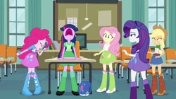 Size: 1128x630 | Tagged: safe, screencap, applejack, fluttershy, pinkie pie, rarity, twilight sparkle, equestria girls, equestria girls (movie), charlie brown, classroom, disguise, incomplete twilight strong, peanuts, table, tara strong, voice actor joke