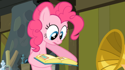 Size: 1054x592 | Tagged: safe, screencap, pinkie pie, earth pony, pony, a friend in deed, book, dat face, solo