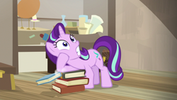 Size: 1280x720 | Tagged: safe, screencap, starlight glimmer, pony, unicorn, uncommon bond, book, female, mare, raised hoof, solo