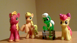 Size: 637x354 | Tagged: safe, artist:solrac31337, apple bloom, applejack, big macintosh, granny smith, earth pony, pony, blind bag, irl, male, photo, stallion, toy