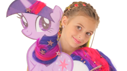 Size: 1280x720 | Tagged: safe, derpibooru import, screencap, twilight sparkle, unicorn twilight, human, pony, unicorn, cardboard cutout, cardboard twilight, hair, irl, irl human, mane, merchandise, official, photo, smiling, stare, tail