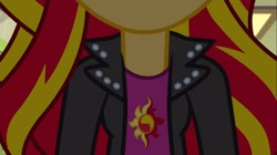 Size: 1100x618 | Tagged: safe, screencap, sunset shimmer, equestria girls, rainbow rocks, breasts, clothes, female, jacket, leather jacket, solo