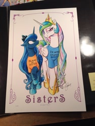 Size: 768x1024 | Tagged: safe, artist:andypriceart, princess celestia, princess luna, alicorn, pony, andy price, andy you magnificent bastard, angry, bedroom eyes, blame my sister, clothes, duo, female, frown, glare, i'm with stupid, looking at you, magic shirt, mare, raised hoof, shirt, smiling, smirk, t-shirt, traditional art, trollestia, unamused