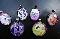 Size: 960x637 | Tagged: safe, artist:deziuntamed, applejack, fluttershy, princess celestia, rarity, spike, twilight sparkle, alicorn, dragon, earth pony, pegasus, pony, unicorn, craft, pendant