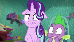 Size: 1280x720 | Tagged: safe, screencap, spike, starlight glimmer, dragon, pony, unicorn, the crystalling, book, bookshelf, disgusted, door, floppy ears, scroll, shocked