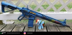 Size: 2166x1056 | Tagged: safe, artist:agentappleblanket, derpibooru import, rainbow dash, pegasus, pony, ar15, custom, female, gun, gunified, irl, mare, my little arsenal, paracord, photo, picatinny rail, race gun, rifle, toy, vinyl figure, weapon