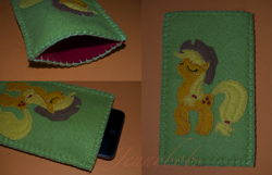 Size: 1391x895 | Tagged: safe, artist:blindfaith-boo, applejack, earth pony, pony, blonde mane, female, mare, orange coat, phone case, solo