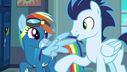 Size: 1920x1080 | Tagged: safe, derpibooru import, screencap, rainbow dash, soarin', pegasus, pony, grannies gone wild, clothes, duo, female, goggles, grin, locker room, male, mare, smiling, spread wings, stallion, uniform, wings, wonderbolts uniform