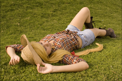 Size: 852x568 | Tagged: safe, artist:deniisseh, applejack, human, cosplay, grass, irl, irl human, on back, photo, solo