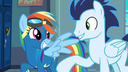 Size: 1920x1080 | Tagged: safe, derpibooru import, screencap, rainbow dash, soarin', pegasus, pony, grannies gone wild, clothes, duo, female, goggles, grin, locker room, male, mare, raised hoof, smiling, spread wings, stallion, uniform, wings, wonderbolts uniform