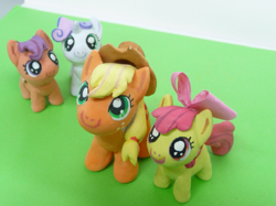 Size: 591x442 | Tagged: safe, artist:raru, apple bloom, applejack, scootaloo, sweetie belle, cutie mark crusaders, irl, photo, sculpture