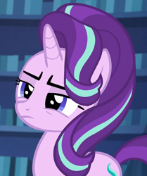 Size: 886x1060 | Tagged: safe, screencap, starlight glimmer, unicorn, every little thing she does, bookshelf, cropped, female, mare, reaction image, solo, squint