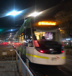 Size: 1446x1536 | Tagged: safe, artist:naijiwizard, starlight glimmer, australia, blurry, irl, lighting, melbourne, melbourne e-class tram, night, photo, photoshop, ponies in real life, solo, speed, surprised, tram