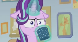 Size: 811x439 | Tagged: safe, screencap, starlight glimmer, pony, unicorn, marks for effort, :i, cup, empathy cocoa, faic, floppy ears, glowing horn, i mean i see, reaction image, solo, unamused