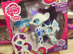 Size: 738x549 | Tagged: safe, rarity, pony, unicorn, cutie mark magic, female, horn, mare, toy, white coat