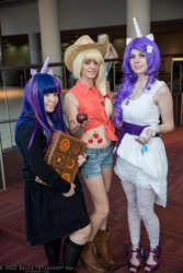 Size: 1365x2048 | Tagged: safe, artist:allyxcat3, artist:lost-in-eyes-of-blue, artist:lunasakamoto, applejack, rarity, twilight sparkle, human, comic con, convention, cosplay, dcc, denver comic con, irl, irl human, photo