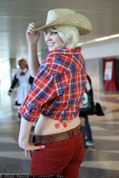 Size: 1365x2048 | Tagged: artist needed, safe, applejack, human, clothes, cosplay, cutie mark, fanimecon, irl, irl human, jeans, photo