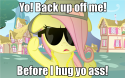 Size: 895x559 | Tagged: safe, fluttershy, pegasus, pony, cute, floppy ears, gangsta, hape, hug life, meme, ponyville, solo, vulgar