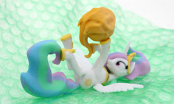 Size: 2000x1200 | Tagged: safe, artist:uncommented, princess celestia, alicorn, pony, 3d print, behaving like a cat, happy, hoofy-kicks, legs in air, on back, photo, playing, shapeways, smiling, solo, spread wings, sun, tangible heavenly object