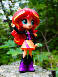 Size: 3672x4896 | Tagged: safe, artist:artofmagicpoland, sunset shimmer, equestria girls, boots, clothes, doll, equestria girls minis, forest, irl, jacket, photo, shoes, skirt, toy