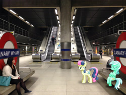 Size: 3264x2448 | Tagged: safe, artist:fureox, artist:geometrymathalgebra, artist:mattyhex, artist:uponia, bon bon, derpy hooves, lyra heartstrings, sweetie drops, human, anatomically incorrect, bon bon is not amused, camera, escalator, food, incorrect leg anatomy, irl, london, metro, photo, ponies in real life, sitting lyra, subway, train, train station, tunnel, unamused, underground, vector