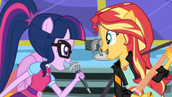 Size: 1920x1080 | Tagged: safe, screencap, sci-twi, sunset shimmer, twilight sparkle, eqg summertime shorts, equestria girls, get the show on the road, bowtie, duo, electric guitar, flying v, geode of empathy, geode of telekinesis, glasses, guitar, looking at each other, magical geodes, microphone, ponied up, ponytail, rebecca shoichet, scitwilicorn, singing, sunset shredder, voice actor joke, wings, youtube link