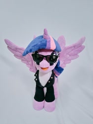 Size: 768x1024 | Tagged: safe, artist:nekokevin, twilight sparkle, twilight sparkle (alicorn), alicorn, pony, clothes, female, irl, jacket, looking at you, mare, open mouth, photo, plushie, simple background, smiling, solo, spread wings, sunglasses, white background, wings