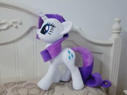 Size: 960x720 | Tagged: safe, artist:nekokevin, rarity, pony, unicorn, bed, female, irl, mare, photo, pillow, plushie, smiling, solo