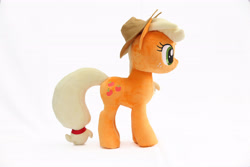 Size: 5184x3456 | Tagged: safe, artist:nekokevin, applejack, earth pony, pony, applejack's hat, cowboy hat, female, freckles, hat, irl, mare, photo, plushie, side view, simple background, smiling, solo, white background