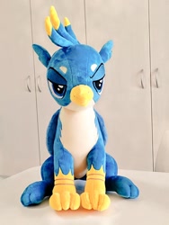 Size: 768x1024 | Tagged: safe, artist:nekokevin, gallus, griffon, irl, lidded eyes, looking at you, male, photo, plushie, sitting, solo, teenager