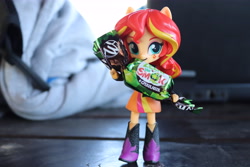 Size: 6000x4000 | Tagged: safe, artist:artofmagicpoland, sunset shimmer, equestria girls, candy, doll, equestria girls minis, food, holding, ponymeet, solo, toy