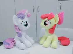 Size: 1024x768 | Tagged: safe, artist:nekokevin, apple bloom, sweetie belle, earth pony, pony, unicorn, bow, duo, female, filly, hair bow, irl, looking at each other, photo, plushie, sitting, smiling