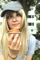Size: 2848x4272 | Tagged: safe, artist:shinshiphen, artist:sukistar, derpy hooves, human, absurd resolution, animagic, clothes, cosplay, costume, derp, food, hat, irl, irl human, muffin, photo, smiling, solo