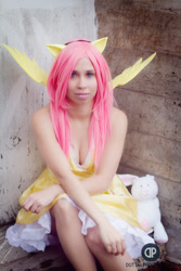 Size: 567x850 | Tagged: safe, artist:onedeviouskitty, fluttershy, human, cleavage, clothes, cosplay, dress, female, irl, irl human, photo, solo