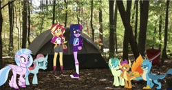 Size: 1761x921 | Tagged: safe, editor:php77, gallus, ocellus, sandbar, sci-twi, silverstream, smolder, sunset shimmer, twilight sparkle, classical hippogriff, griffon, hippogriff, equestria girls, backpack, bag, belt, boots, camp everfree outfits, campfire, camping trip, converse, equestria girls in real life, family, forest, glasses, irl, photo, ponies in real life, ponytail, shoes, sun, tent, wallpaper