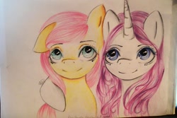 Size: 800x535 | Tagged: safe, artist:anuhanele, fluttershy, rarity, pegasus, pony, unicorn, female, horn, mare, traditional art