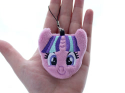 Size: 1343x1000 | Tagged: safe, artist:meplushyou, starlight glimmer, human, pony, unicorn, charm, female, hand, irl, irl human, looking at you, mare, photo, plushie, smiling