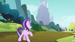 Size: 1280x720 | Tagged: safe, screencap, starlight glimmer, pony, unicorn, no second prances, cloud, confused, female, flower, forest, frown, hill, looking up, mare, mountain, path, raised hoof, scenery, sky, solo, tree