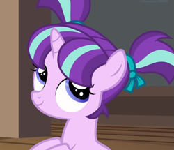 Size: 1089x936 | Tagged: safe, screencap, starlight glimmer, pony, unicorn, uncommon bond, cropped, female, filly, filly starlight glimmer, pigtails, ribbon, smiling, solo, younger