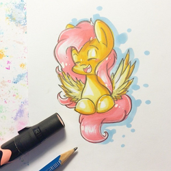 Size: 605x604 | Tagged: safe, artist:y0wai, fluttershy, pegasus, pony, cute, eyes closed, open mouth, pencil, prone, smiling, solo, spread wings, traditional art