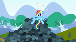 Size: 640x360 | Tagged: safe, derpibooru import, screencap, rainbow dash, pegasus, pony, spike at your service, circling stars, derp, dizzy, female, mare, on back, rock, solo