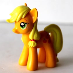 Size: 1024x1024 | Tagged: safe, applejack, earth pony, pony, blonde mane, female, freckles, mare, orange coat, solo, toy