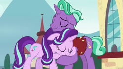 Size: 1024x576 | Tagged: safe, screencap, firelight, starlight glimmer, pony, unicorn, the parent map, cute, eyes closed, father and child, father and daughter, female, hug, male, mare, parent and child, reformed starlight, stallion