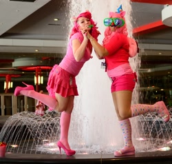 Size: 1928x1833 | Tagged: safe, pinkie pie, human, clothes, cosplay, fountain, groucho mask, high heels, irl, irl human, photo, skirt, tail, water