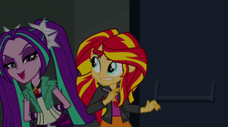 Size: 1280x714 | Tagged: safe, screencap, aria blaze, sunset shimmer, equestria girls, rainbow rocks, canterlot high, clothes, gem, jacket, leather jacket, pigtails, siren gem, twintails, vest