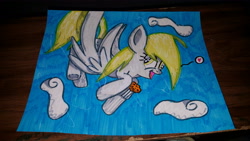 Size: 5312x2988 | Tagged: safe, artist:auroraflame1, derpy hooves, cloud, flying, food, muffin, photo, solo, traditional art