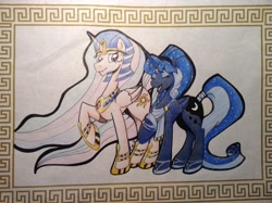 Size: 1024x765 | Tagged: safe, artist:caleighrg, idw, princess celestia, princess luna, alicorn, pony, artemis luna, egyptian, eyes closed, greek, mirror universe, ra celestia, raised hoof, smiling, traditional art