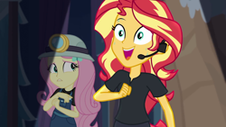 Size: 1280x720 | Tagged: safe, screencap, fluttershy, sunset shimmer, equestria girls, equestria girls series, opening night, opening night: sunset shimmer, director shimmer, duo, duo female, female, headset, helmet, miner, mining helmet, sweat